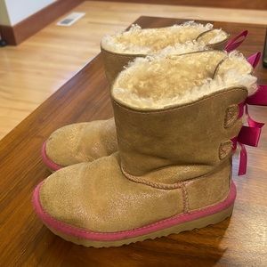 Girls size 12 UGG boots, pink bow